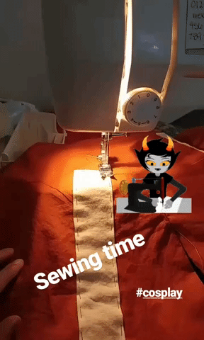 Frida Coco sewing